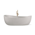 Hawaii freestanding concrete bathtub with wave-inspired design shown from front angle in a soft, silvery grey shade known as Platinum.
